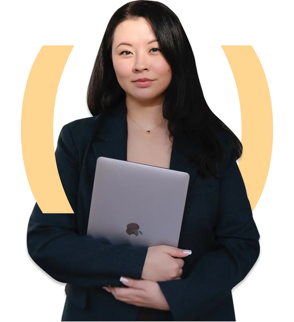 Professional woman holding a laptop