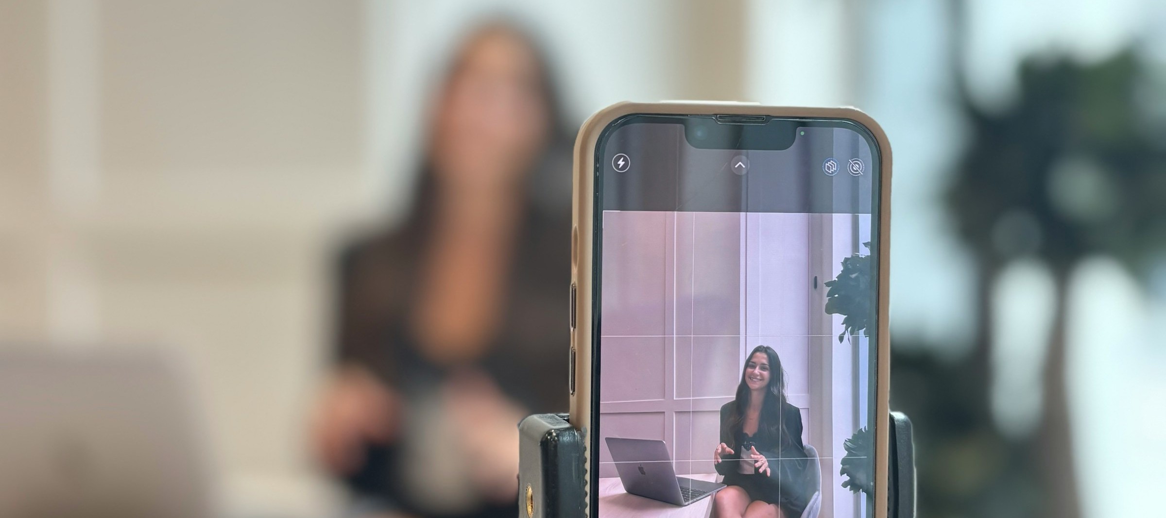 A phone on a tripod recording a practice interview answer