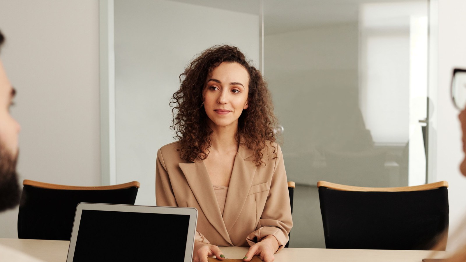 A composed professional in a job interview abroad